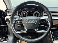 2023 Audi A8L 50 TFSI quattro Premium, чёрный — фото 15