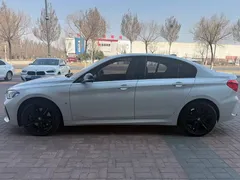 2021 BMW 1 Series 125i M Sport Night Edition, белый — фото 2