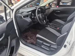2023 Toyota Corolla 1.2T Pioneer, белый — фото 7