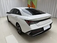 2023 Hyundai Elantra 1.5L CVT LUX Premium, белый — фото 13