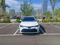 2021 Toyota Corolla 1.2T S-CVT Elite, белый — фото 2