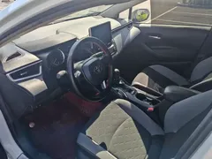 2021 Toyota Corolla 1.2T S-CVT Elite, белый — фото 4