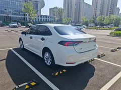 2021 Toyota Corolla 1.2T S-CVT Elite, белый — фото 7
