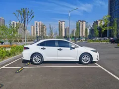 2021 Toyota Corolla 1.2T S-CVT Elite, белый — фото 8