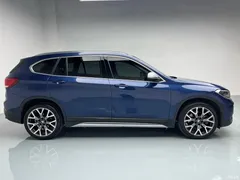 2021 BMW X1 xDrive25Li Exclusive, синий — фото 4