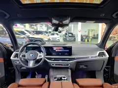 2023 BMW X7 xDrive40i Exclusive Luxury Package, синий — фото 3
