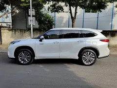 2022 Toyota Highlander Hybrid 2.5L 4WD Premium 7, белый — фото 3
