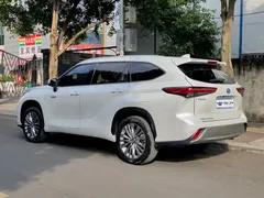 2022 Toyota Highlander Hybrid 2.5L 4WD Premium 7, белый — фото 4