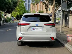 2022 Toyota Highlander Hybrid 2.5L 4WD Premium 7, белый — фото 5