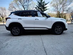 2023 Kia Seltos 1.5L CVT Luxury, белый — фото 7