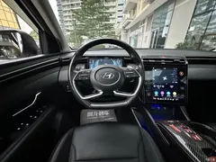 2021 Hyundai Tucson Tucson L 1.5T DCT LUX Premium, белый — фото 23