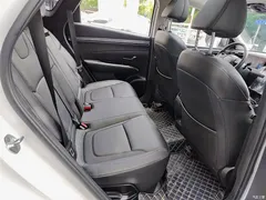 2021 Hyundai Tucson Tucson L 1.5T DCT LUX Premium, белый — фото 11