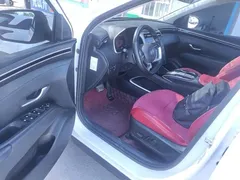 2023 Hyundai Tucson L 1.5T AT 2WD GLX Elite, белый — фото 16