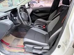 2021 Toyota Corolla 1.2T S-CVT Pioneer, белый — фото 8