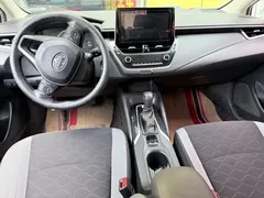 2021 Toyota Corolla 1.2T S-CVT Pioneer, белый — фото 12