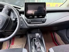 2021 Toyota Corolla 1.2T S-CVT Pioneer, белый — фото 14