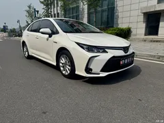 2021 Toyota Corolla Hybrid 1.8L E-CVT Elite, белый — фото 3