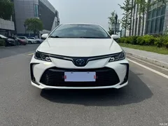 2021 Toyota Corolla Hybrid 1.8L E-CVT Elite, белый — фото 5