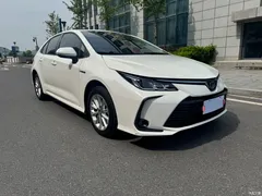 2021 Toyota Corolla Hybrid 1.8L E-CVT Elite, белый — фото 6