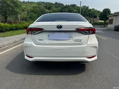 2021 Toyota Corolla Hybrid 1.8L E-CVT Elite, белый — фото 8