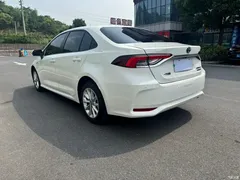 2021 Toyota Corolla Hybrid 1.8L E-CVT Elite, белый — фото 9