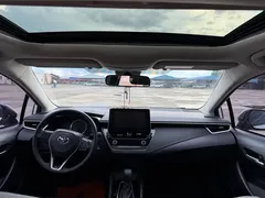 2021 Toyota Corolla 1.2T S-CVT Elite, белый — фото 9