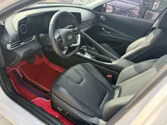 2023 Hyundai Elantra 1.5L CVT LUX Premium, белый — фото 4