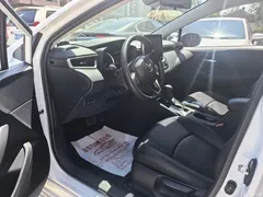2021 Toyota Corolla 1.2T S-CVT Elite PLUS, белый — фото 7