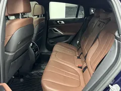 2021 BMW X6 xDrive40i M, синий — фото 11