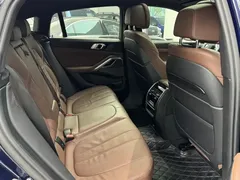 2021 BMW X6 xDrive40i M, синий — фото 12