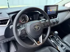 2023 Toyota Corolla 1.5L, белый — фото 7