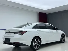 2021 Hyundai Elantra 1.5L CVT LUX Premium, белый — фото 6