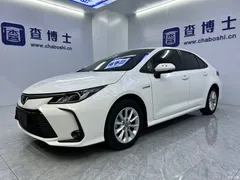 2021 Toyota Corolla Hybrid 1.8L E-CVT Elite, белый — фото 1