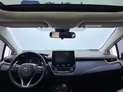 2021 Toyota Corolla Hybrid 1.8L E-CVT Elite, белый — фото 14