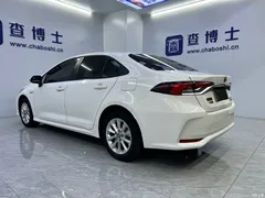 2021 Toyota Corolla Hybrid 1.8L E-CVT Elite, белый — фото 15