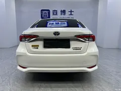 2021 Toyota Corolla Hybrid 1.8L E-CVT Elite, белый — фото 16