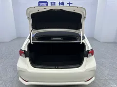 2021 Toyota Corolla Hybrid 1.8L E-CVT Elite, белый — фото 18