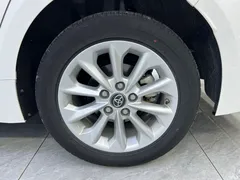 2021 Toyota Corolla Hybrid 1.8L E-CVT Elite, белый — фото 19