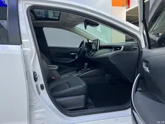 2021 Toyota Corolla Hybrid 1.8L E-CVT Elite, белый — фото 21