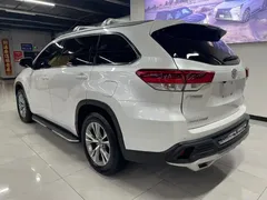 2021 Toyota Highlander 2.0T 4WD Elite 7-seat, белый — фото 4