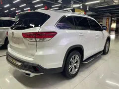 2021 Toyota Highlander 2.0T 4WD Elite 7-seat, белый — фото 6
