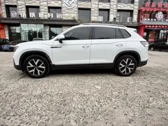 2023 Volkswagen Tayron 280TSI 2WD Plus, белый — фото 8