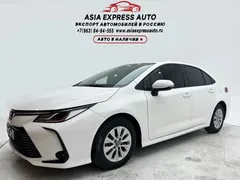 2021 Toyota Corolla TNGA 1.5L CVT Elite, белый — фото 1