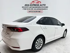 2021 Toyota Corolla TNGA 1.5L CVT Elite, белый — фото 4