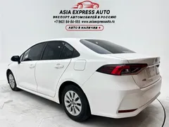 2021 Toyota Corolla TNGA 1.5L CVT Elite, белый — фото 6