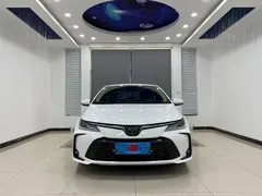 2021 Toyota Corolla TNGA 1.5L CVT Elite, белый — фото 2