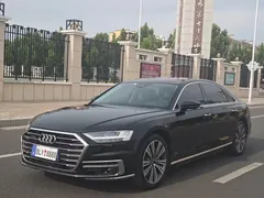 2021 Audi A8L 55 TFSI quattro, чёрный — фото 1