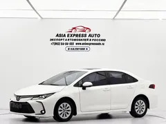 2021 Toyota Corolla TNGA 1.5L CVT Elite, белый — фото 1