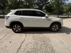 2023 Volkswagen Tayron 280TSI 2WD Plus, белый — фото 7