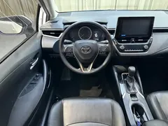2021 Toyota Corolla 1.2T S-CVT Elite, белый — фото 11